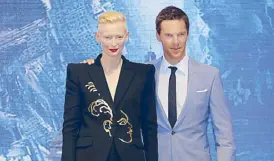  ??  ?? The Master and The Doctor: Tilda Swinton and Benedict Cumberbatc­h strike a pose at the Hong Kong red carpet event of Doctor Strange.