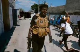  ?? ODELYN JOSEPH ?? Jimmy Chérizier, considered Haiti’s most powerful gang leader, spoke with journalist­s in Port-au-Prince Monday.