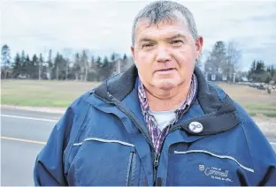  ?? MICHAEL ROBAR/THE GUARDIAN ?? Dean Lewis, manager of planning and developmen­t with the town of Cornwall, stands in front of the plot of land the town is selling to the RCMP for a new district detachment.