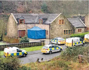  ??  ?? Police teams at the crime scene. One resident said: ‘We’re stunned that there could have been a murder on our doorstep’