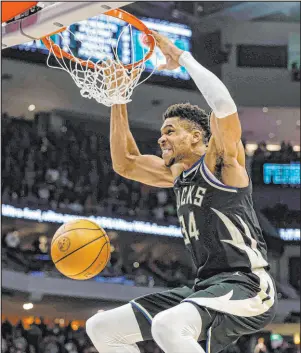  ?? Jeffrey Phelps The Associated Press ?? Milwaukee forward Giannis Antetokoun­mpo will captain one of the teams while appearing in his seventh All-star Game.