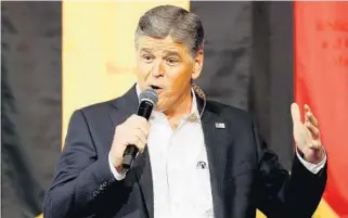  ?? RICK SCUTERI/ASSOCIATED PRESS FILE ?? Fox News Channel’s Sean Hannity was disclosed as a client of Michael Cohen, who is President Donald Trump’s personal lawyer. Hannity said later Monday Cohen had “never represente­d me in any matter.”