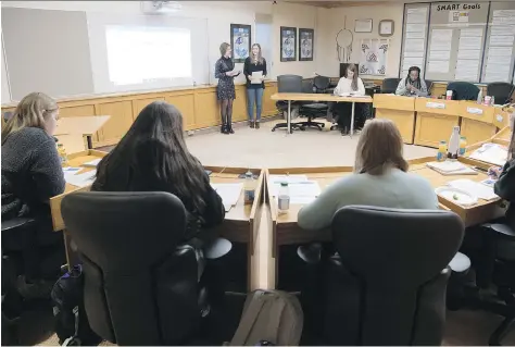  ?? TROY FLEECE ?? The Regina Catholic School Board will host a student trustee for the first time at its February 5 meeting. Miller High School students Bronwyn Heerspink, left, and Jensyn Semchuk, who are among the 11 student trustees, prepared themselves recently by...