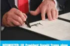  ?? — AFP ?? BEDMISTER: US President Donald Trump signs executive orders extending coronaviru­s economic relief, during a news conference in Bedminster, New Jersey, on Saturday.