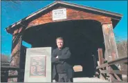  ?? TANIA BARRICKLO — DAILY FREEMAN FILE ?? Ulster County Tourism Director Rick Remsnyder is shown at Perrine’s Bridge in Rifton, N.Y., in 2012.