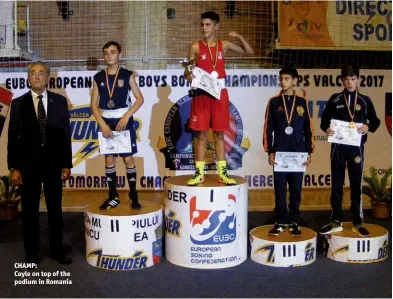  ??  ?? CHAMP: Coyle on top of the podium in Romania