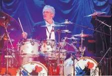  ?? MJ KIM/ASSOCIATED PRESS ?? British musician Ginger Baker performs at the “Zildjian Drummers Achievemen­t Awards” at the Shepherd’s Bush Empire in London in 2008.