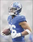  ?? Sarah Stier / Getty Images ?? Saquon Barkley of the Giants had 72 yards on 18 carries in his first game back.