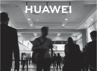  ?? HANNIBAL HANSCHKE/REUTERS ?? The Huawei logo is pictured at the IFA consumer tech fair in Berlin, Germany, earlier this year.