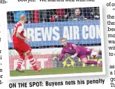  ??  ?? his penalty ON THE SPOT: Buyens nets