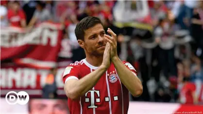  ??  ?? Xabi Alonso won three Bundesliga titles and the DFB Pokal once during a three-year spell with Bayern Munich.