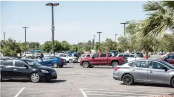  ?? CENGIZ YAR/GETTY IMAGES ?? Fully a third of the surface space in many big cities is used for parking, writes Kevin Krizek of the University of Colorado at Boulder.