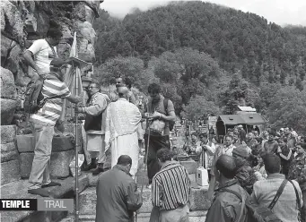  ?? — PTI ?? A group of Kashmiri pandits at Naran Naag temple, in Jammu and Kashmir’s Ganderbal district, on Monday before leaving for Gangabal Lake, located high in the Harmukh range.