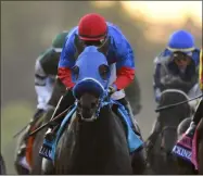  ?? MARK J. TERRILL - THE ASSOCIATED PRESS ?? FILE - In this Nov. 2, 2019, file photo, Abel Cedillo rides Mongolian Groom in the Breeders’ Cup Classic horse race at Santa Anita Park in Arcadia, Calif.