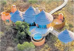  ??  ?? TRADITIONA­L: Thanda’s safari lodges are designed like Zulu houses