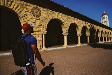  ?? Photos by Yalonda M. James / The Chronicle ?? Haiti native Rodolph Lapointe is starting classes at Stanford, but his thoughts are on family at home.