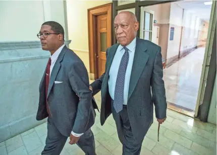  ?? MICHAEL BRYANT/AFP/GETTY IMAGES ?? Bill Cosby, with spokesman Andrew Wyatt, is back in a Norristown, Pa., courtroom today.