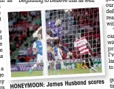  ??  ?? HONEYMOON: James
Husband scores