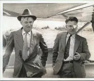  ?? INTERNATIO­NAL NEWS PHOTOS ?? Humorist Will Rogers (left) and flying wiz Wiley Post pose for a Hearst Metrotone News cameraman just before they take off from Seattle, for Juneau, Alaska, in the summer of 1935. Rogers and Post were both killed when their plane crashed near Point...