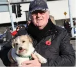  ??  ?? Sean Norris with Scrappy the Dog at the annual Drogheda Remembranc­e Day