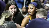  ?? ?? LSU’s Angel Reese (right) understood the magnitude of Monday’s game. “I think it’s just great for the sport, just being able to be a part of history,” she said.