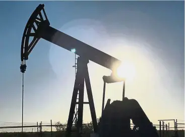  ??  ?? Good location: An oil pump is seen operating in the Permian Basin near Midland, Texas.Texas Pacific Land Trust has vast tracts of mineral rights in the Permian Basin, the world’s hottest major oil region, earning revenues from the likes of Chevron...