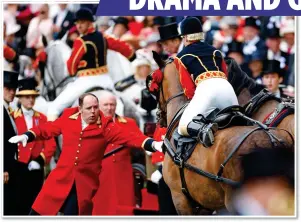  ?? ?? THIS is the moment when the Royal procession at Ascot threatened to turn into disaster.
As the procession neared its end, one of the horses pulling the carriage of Princess Beatrice and her husband Edoardo suddenly became spooked and started bucking, seemingly out of control.
Hundreds of spectators pointed and gasped, but the Royal escort remained in the saddle and quickly brought the horse under control.
The Princess, circled, appeared unfazed and left the carriage smiling.