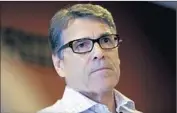  ?? Charlie Neibergall Associated Press ?? A TEXAS judicial panel said one of two charges against former Gov. Rick Perry may proceed to trial.