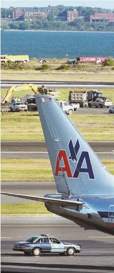  ?? STAFF FILE PHOTO, RIGHT, BY JIM MAHONEY; HERALD FILE PHOTO, ABOVE ?? STILL FELT: The last suit linking Logan Internatio­nal Airport, above, and the two doomed airliners that left on Sept. 11, 2001, later crashing into New York City’s World Trade Center, right, has been settled for $95 million.