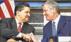  ?? JAMES KEIVOM/DAILY NEWS ?? Richard Carranza (left with Mayor de Blasio) oversees school system that spent $1 billion more, despite having 19,000 fewer students.