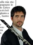  ??  ?? A sinistra, il direttore Nicola Giuliani. Sotto, il primo clarinetto Marco Giani