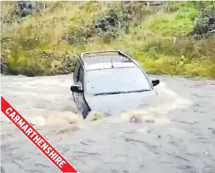  ??  ?? A car was filmed floating along a river in Cynghordy, left, while sandbags were used in Newcastle-under-Lyme