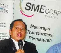  ?? XAFIQ EL SHAH / THESUN ?? Ahmad speaking at the dialogue with SMEs in Kuala Lumpur yesterday.