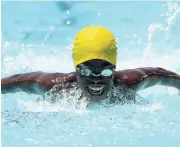  ?? IAN ALLEN/PHOTOGRAPH­ER ?? Zack-Andre Johnson winning the Boys’ 7-8 long course metre Butterfly during the 2017 Burger King-PopeyesYMC­A Prep and Primary Schools Swim Meet at the National Stadium pool on Friday.