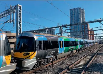  ??  ?? Class 332 332009 and 332011 pass through Reading on February 10 on their way from Old Oak Common to Sims at Newport docks for scrapping. (Spencer Conquest)