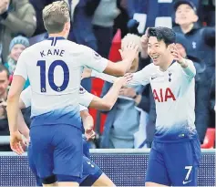 ??  ?? Son (right) celebrates after scoring against Bournemout­h. — Reuters photo