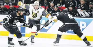  ?? HARRY HOW/GETTY IMAGES ?? Los Angeles defenceman Drew Doughty, right, says he wants to stay with the Kings.