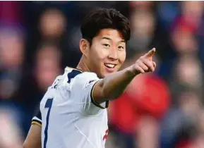  ??  ?? Tottenham’s Son Heung-min celebrates scoring their second goal against Burnley on Sunday.
