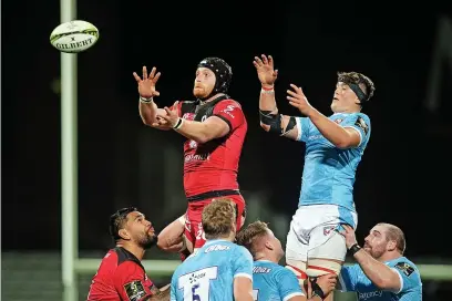  ?? ?? Kilian Geraci of Lyon and Harry Taylor of Gloucester jump for the ball during the Challenge Cup game at Stade Gerland