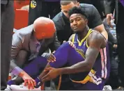  ?? JONATHAN DANIEL — GETTY IMAGES ?? Warriors’ Jordan Bell (2) suffered a sprained left ankle on the first play of the game against the Bulls on Wednesday.