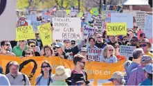  ?? JIM THOMPSON/JOURNAL FILE ?? Thousands of protesters gathered in Tiguex Park in Old Town at the March for Our Lives event on March 24, part of a nationwide movement calling for action on gun violence. A “Day of Action” is planned for today to also advocate for further school...