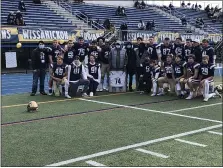  ?? ANDREW ROBINSON - MEDIANEWS GROUP ?? La Salle’s senior class stands with the family of Isaiah Turner on Saturday.