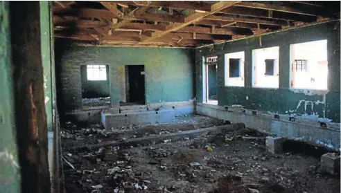  ?? Pictures: SIMTEMBILE MGIDI ?? GUTTED: Floorboard­s and ceiling boards have been removed and the interior of the buildings, which formerly housed the offices of the Group 39 division of the SANDF, have been vandalised