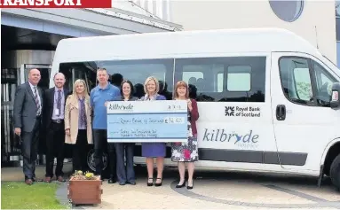  ??  ?? Cheque this Hospice staff and officials from the Royal Bank of Scotland were at the official unveiling