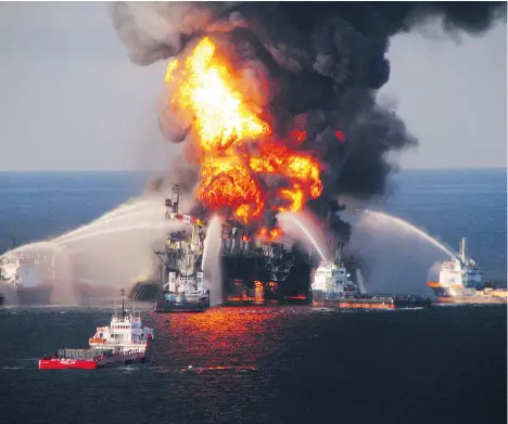  ?? U.S. COAST GUARD VIA GETTY IMAGES ?? In 2014, a federal judge found BP was primarily responsibl­e for the Deepwater Horizon disaster and had to pay billions of dollars in penalties, on top of billions in cleanup costs. More than four million barrels of oil flowed from the well over an...