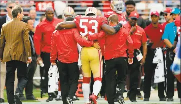  ?? FILE PHOTO BY JOSIE LEPE — STAFF PHOTOGRAPH­ER ?? NaVorro Bowman is helped off the field after his injury with the 49ers in 2016. He missed time with a ruptured Achilles.