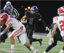  ?? NEWS-SENTINEL FILE ?? Tokay's Vincent Romero runs the ball against Lodi at Hubbard Field on Nov. 2, 2019.