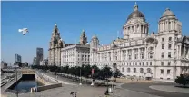  ?? PHOTO: REUTERS ?? Trio . . . The Royal Liver Building, Cunard Building and Port of Liverpool Building, will continue to be known as Liverpool’s Three Graces, despite the city’s loss of Unesco World Heritage status.