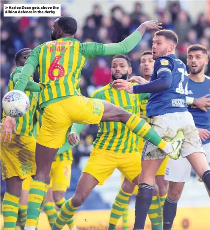  ??  ?? > Harlee Dean gets above the Albion defence in the derby