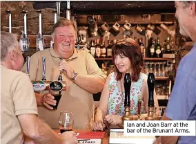  ?? ?? Ian and Joan Barr at the bar of the Brunant Arms.